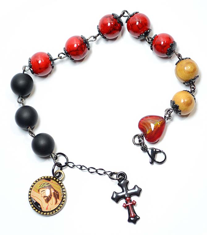 <span style="color: #b50500;">The Sorrowful</span><br>Crucifixion